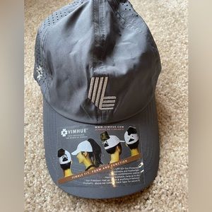 Gray LIV golf hat with ponytail slot